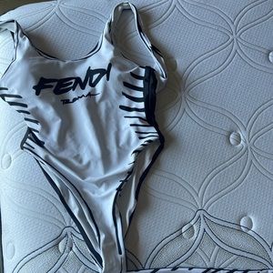 Swimsuit and workout pants